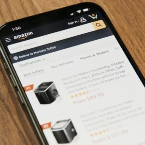 a cell phone sitting on top of a wooden table